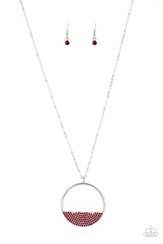 Encrusted in dainty red rhinestones, a silver crescent frame is pressed into the bottom of an airy circular pendant for a timeless look. Features an adjustable clasp closure. Sold as one individual necklace. Includes one pair of matching earrings.
