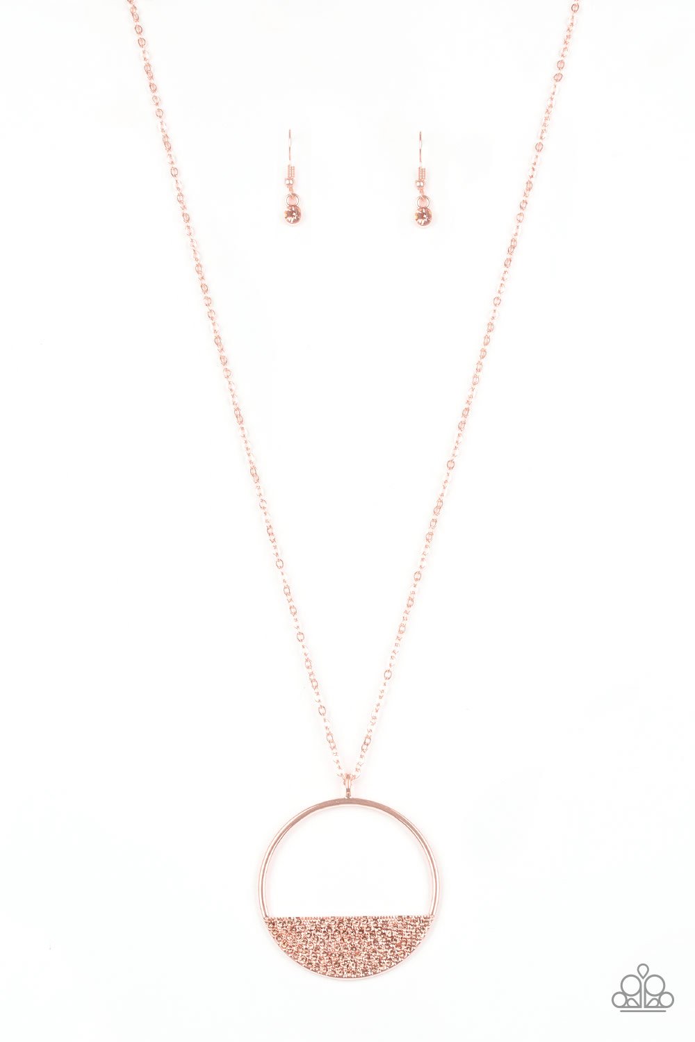 Encrusted in dainty peach rhinestones, a shiny copper crescent frame is pressed into the bottom of an airy circular pendant for a timeless look. Features an adjustable clasp closure. Sold as one individual necklace. Includes one pair of matching earrings.