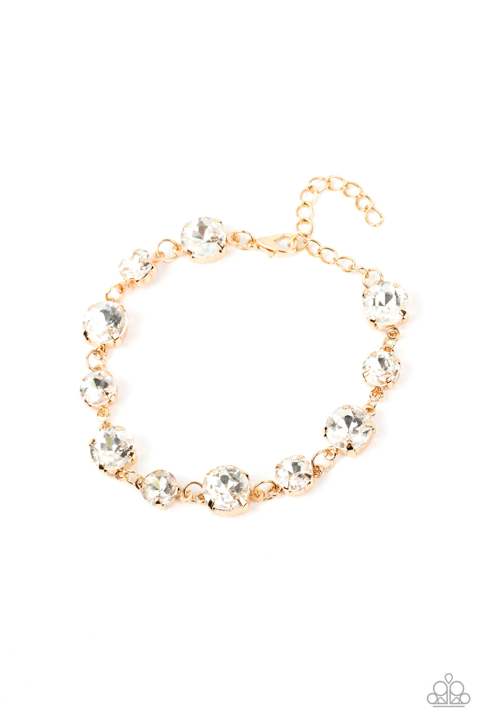 Varying sizes of stunning white rhinestones set in gold pronged settings delicately link together around the wrist, creating a glassy strand of swoon-worthy style. Features an adjustable clasp closure.
Sold as one individual bracelet.