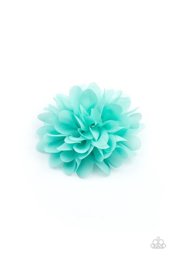 Blue chiffon petals gather into a plush blossom, creating a colorful springtime inspired flower. Features a standard hair clip on the back. Sold as one individual hair clip.