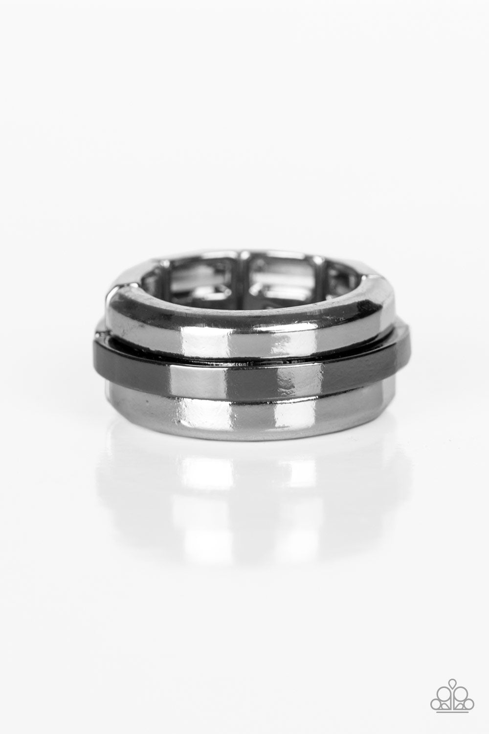 A glistening gunmetal bar arcs across the center of a thick silver band for a modern look. Features a stretchy band for a flexible fit. Sold as one individual ring.