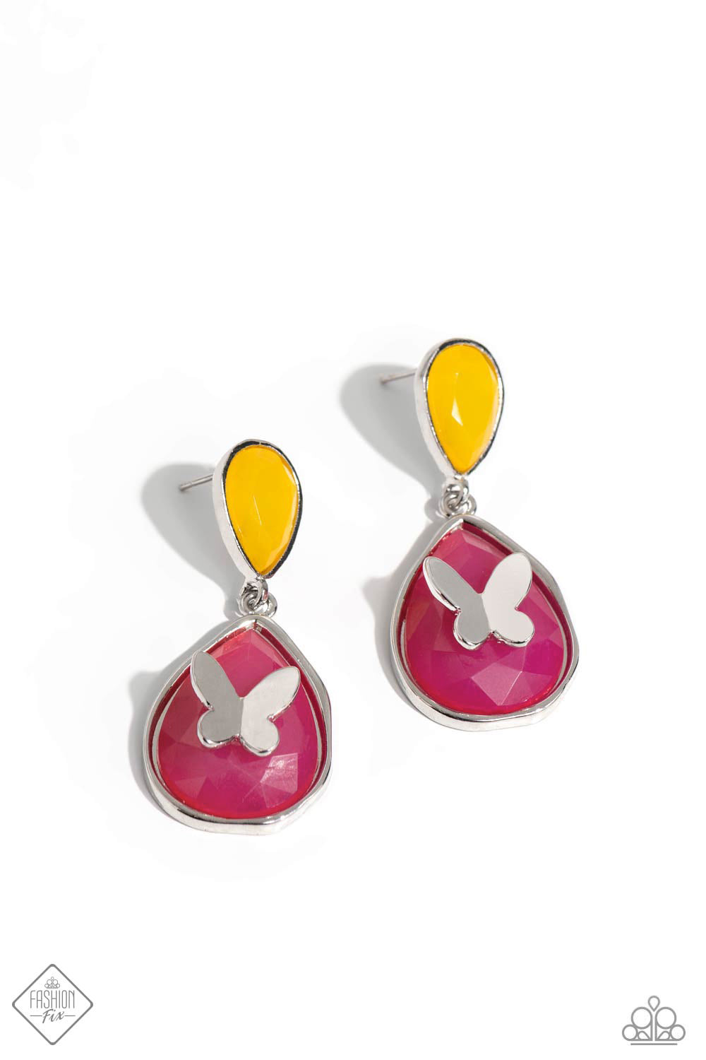 An exaggerated pink teardrop-shaped acrylic swings from the bottom of an upside-down yellow teardrop-shaped acrylic, creating a dramatically colorful lure. A dainty silver butterfly flutters atop the center of the pink acrylic for a whimsical finish. Earring attaches to a standard post fitting. Sold as one pair of post earrings.