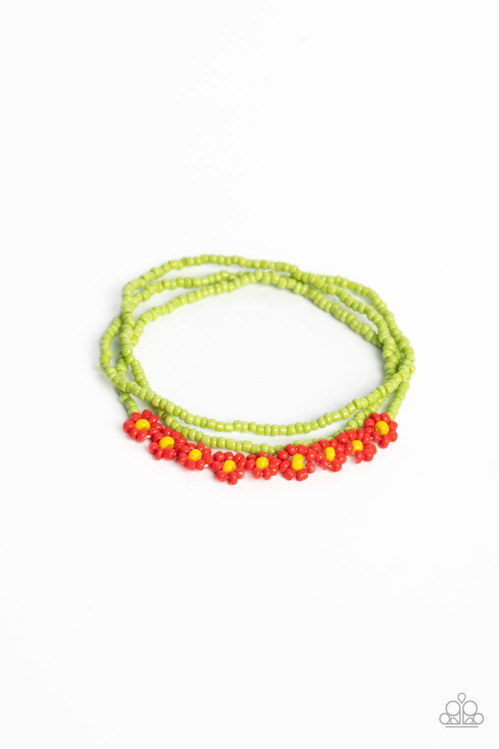 Strung along the entirety of three elastic stretchy bands, apple green seed beads coalesce around the wrist. Featured on one of the bands of green seed beads, blooming red seed bead flowers, with yellow seed bead centers haphazardly interrupt the refreshing collection for a carefree, charismatic finish. Sold as one set of three bracelets.