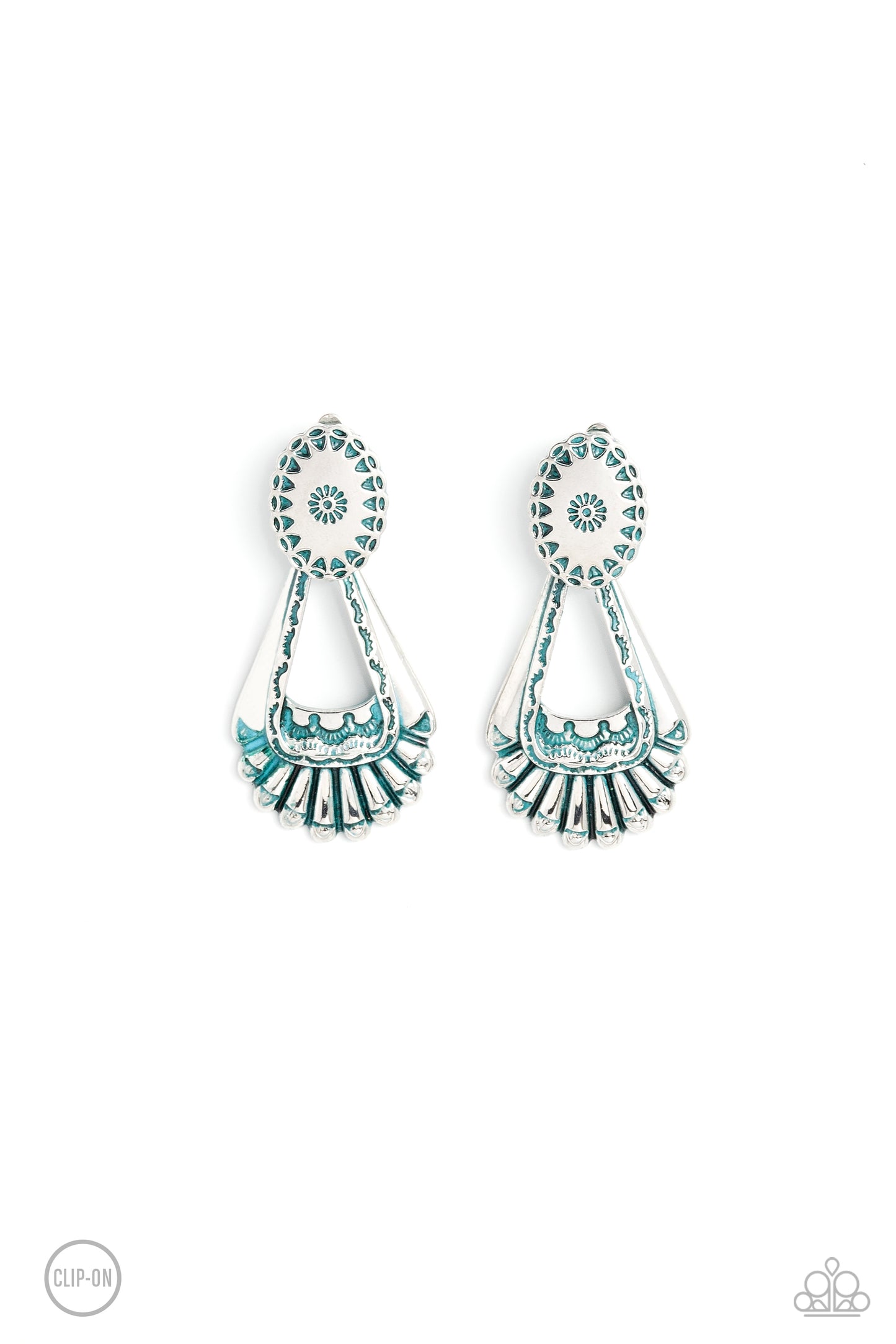 Dangling from a Southwestern-patterned post, a rustic, silver patina frame swings for some aged authenticity below the ear. Feathered details stream from the lower frame for additional artisanal detail. Earring attaches to a standard clip-on fitting. Sold as one pair of clip-on earrings.