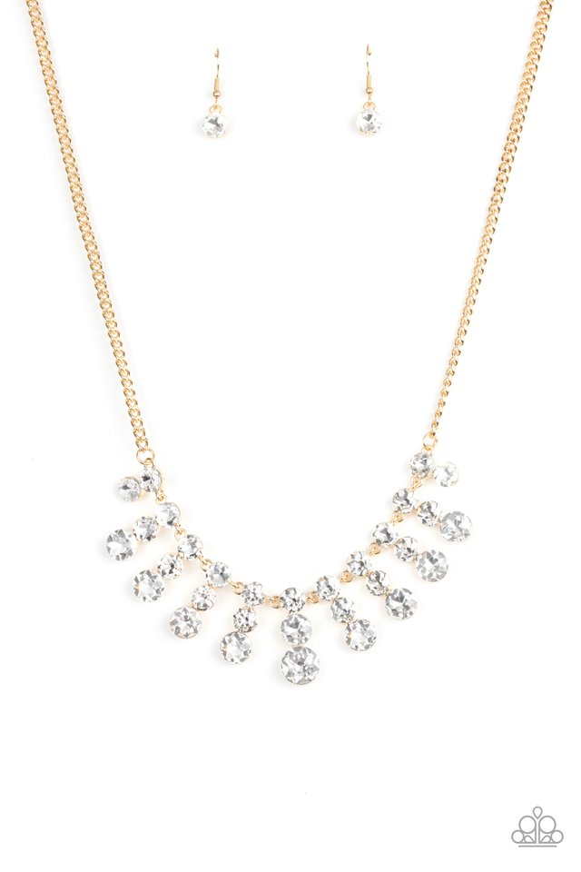 Glittery stacks of glassy white rhinestones gradually increase in size as they drip from the bottom of a classic gold chain, creating a blinding fringe below the collar. Features an adjustable clasp closure. Sold as one individual necklace. Includes one pair of matching earrings.