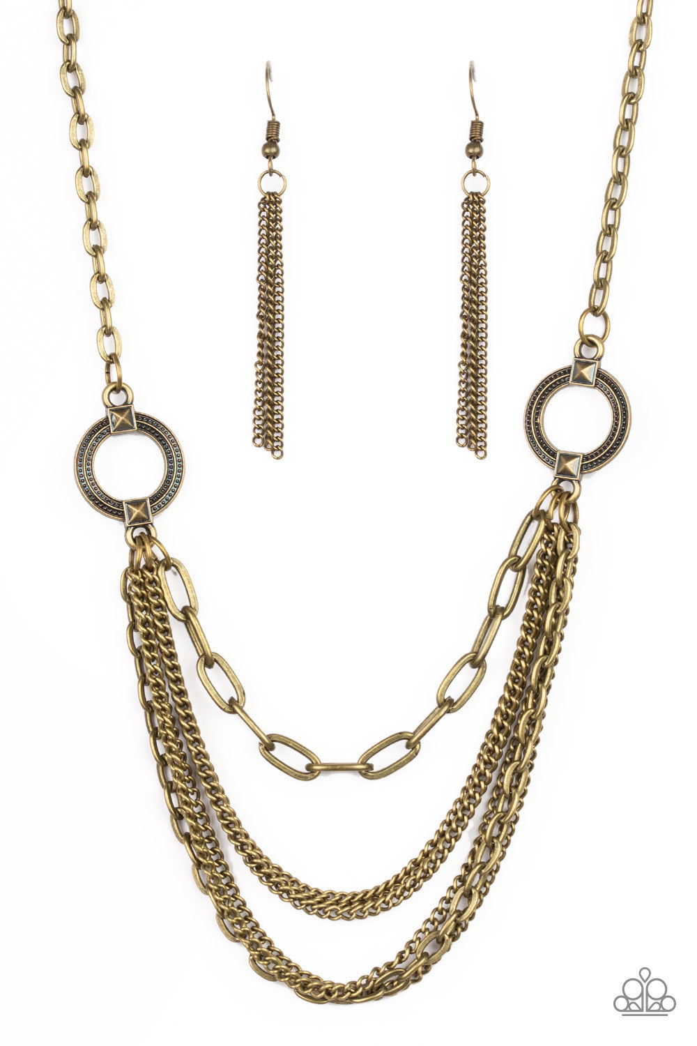 Ornate brass hoops give way to mismatched brass chains below the collar for an edgy industrial look. Features an adjustable clasp closure. Sold as one individual necklace. Includes one pair of matching earrings.