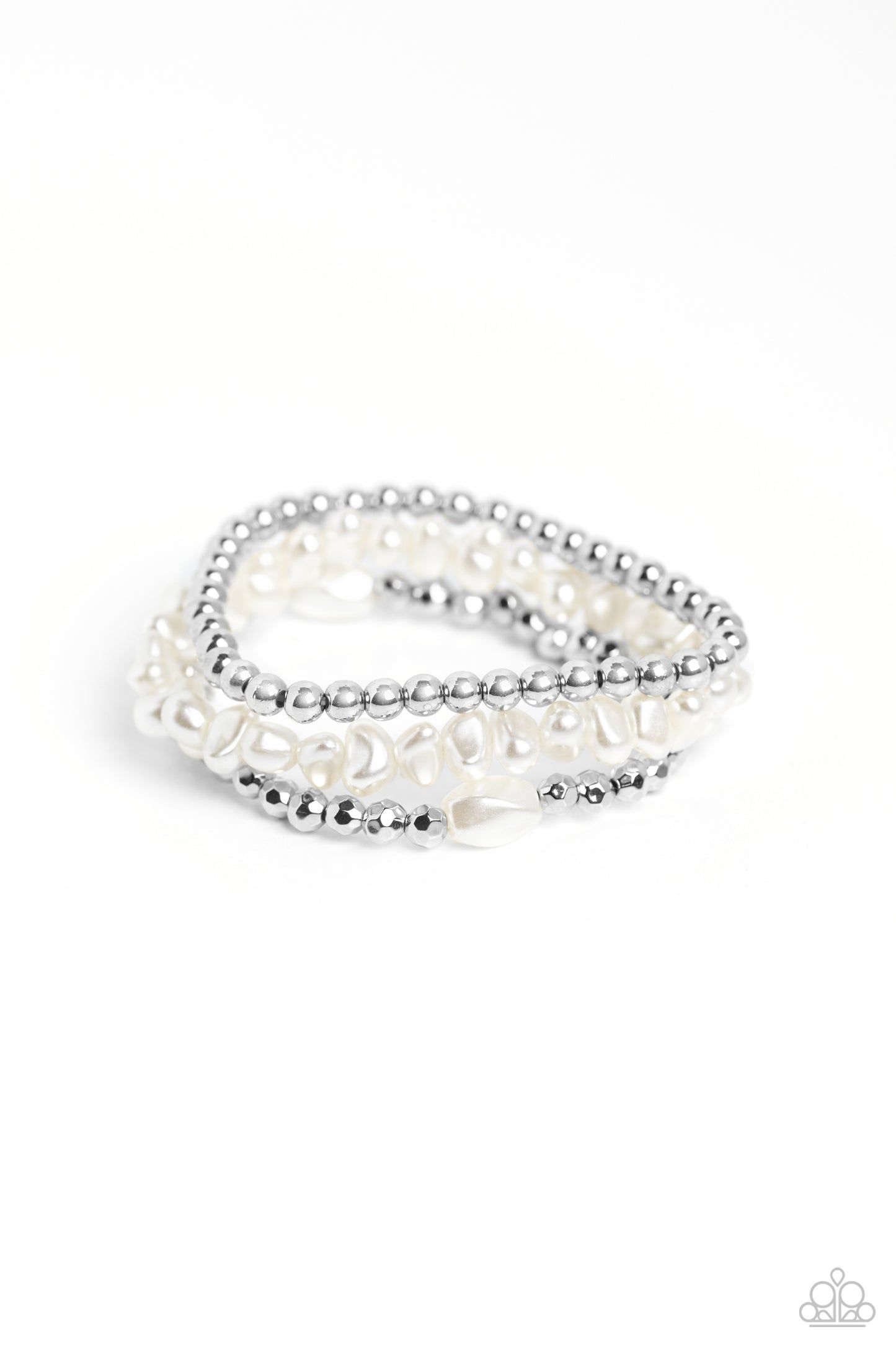 Coalescing into a light-reflecting stack up the wrist, silver beads, baroque white pearl beads, and faceted silver beads with a solitaire white pearl bead wrap around the wrist on elastic stretchy bands for a fashionable display.
Sold as one set of three bracelets.