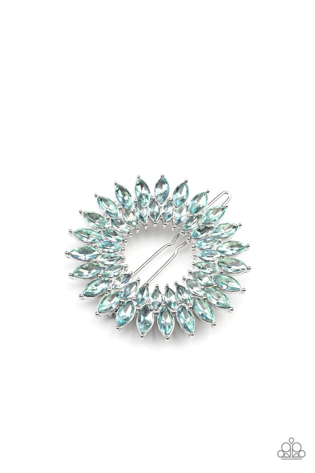 An explosion of blue marquise cut rhinestones delicately coalesce into two sparkly rings, creating a glittery centerpiece. Features a clamp barrette closure Sold as one individual barrette.