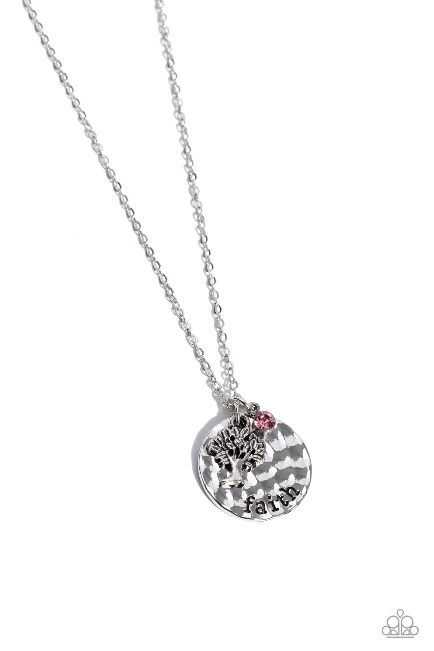 Hanging down the neckline, a silver disc, hammered in a high-sheen finish features the stamped word "faith". Gliding from a dainty silver chain, a detailed tree charm and a dainty pink rhinestone pressed into a silver frame finish the design with a sparkly flourish. Features an adjustable clasp closure. Sold as one individual necklace. Includes one pair of matching earrings.
