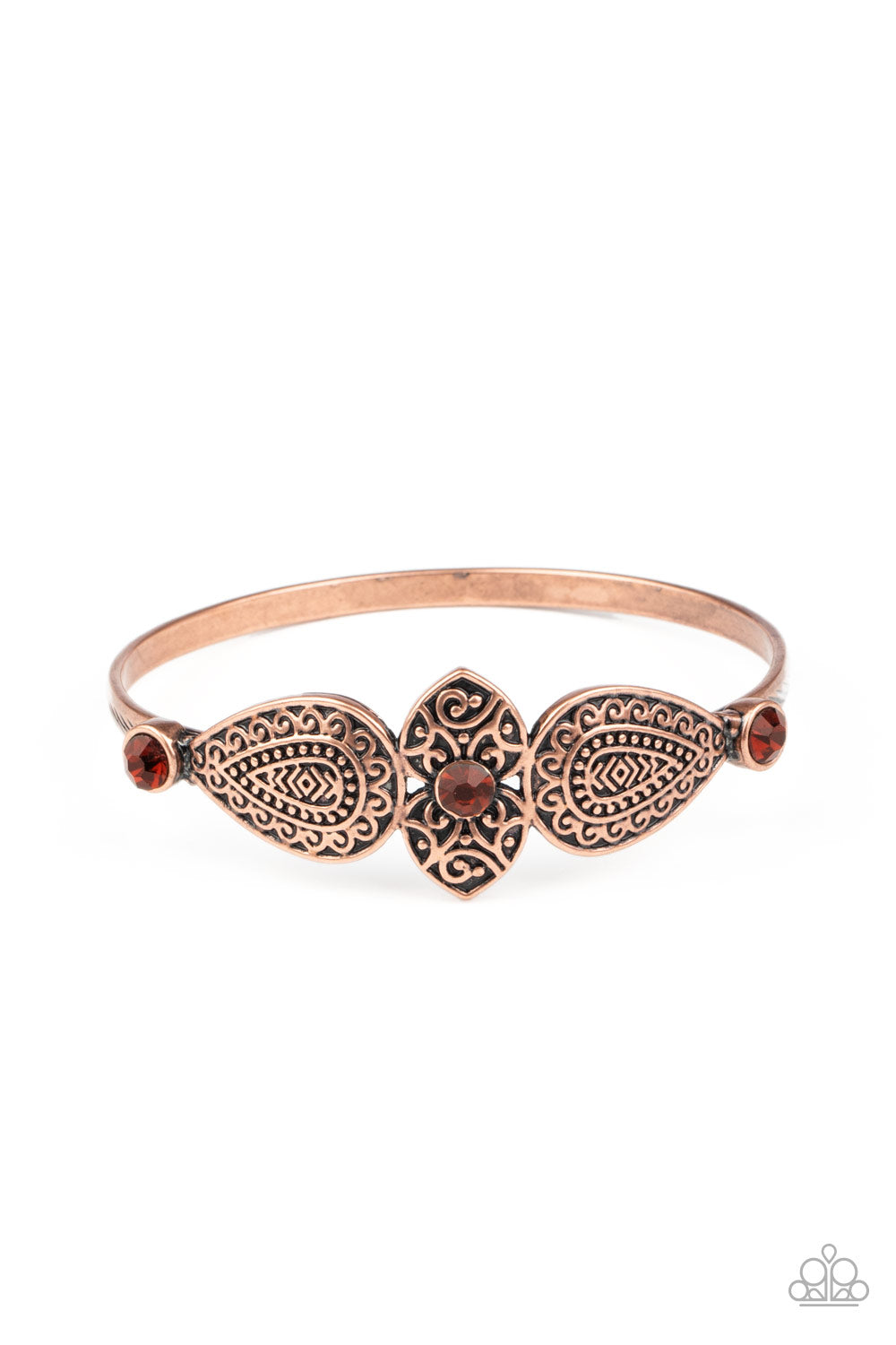 Embossed in decorative filigree, leafy copper frames connect into a whimsical centerpiece atop a copper bangle. Glittery rhinestones dot the ornate centerpiece, adding colorful sparkle to the dainty piece. Sold as one individual bracelet.