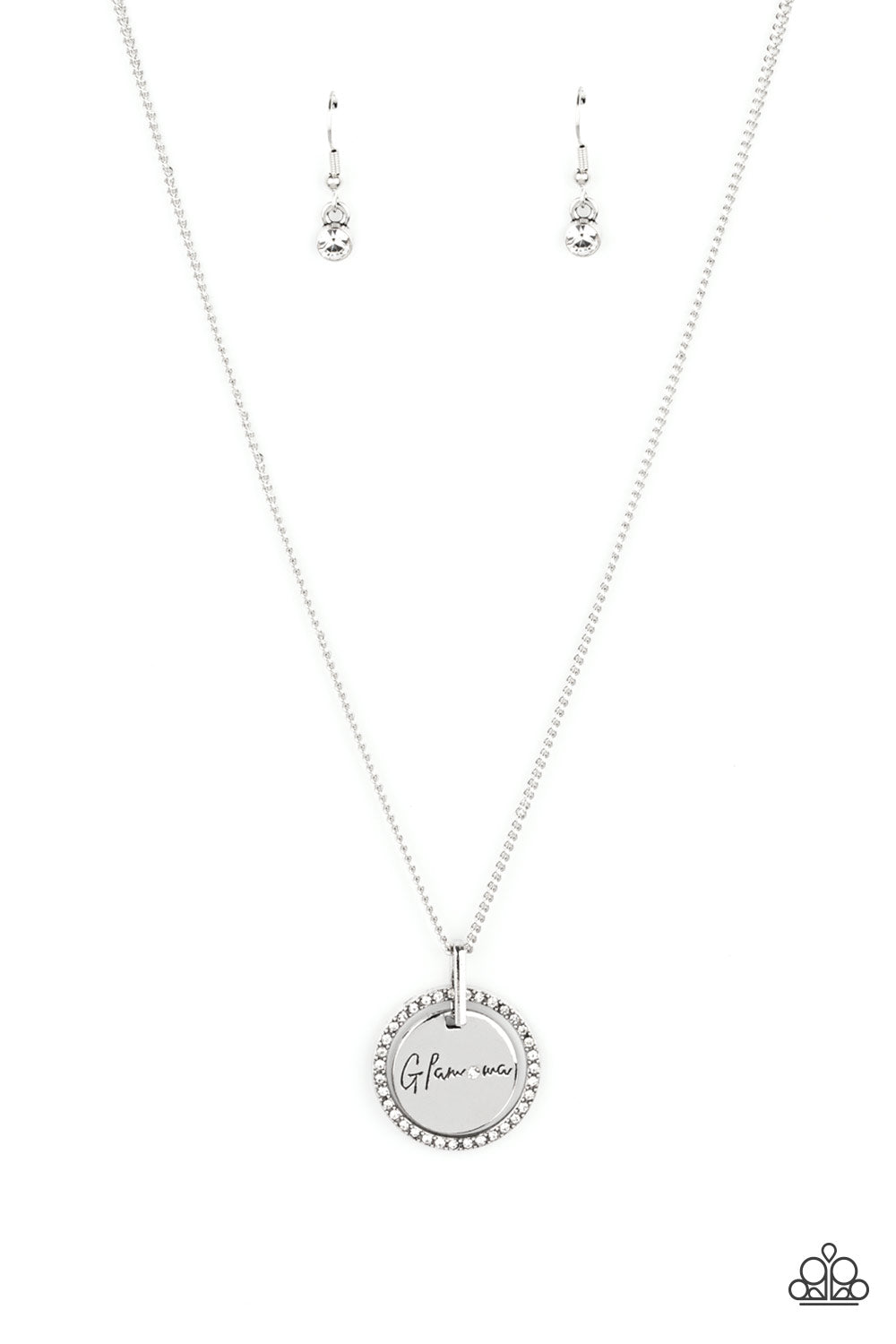 Infused with a silver ring of glassy white rhinestones, a glistening silver disc is dotted with a dainty white rhinestone and stamped in the word, "Glamma," as it swings below the collar for a glamorously sentimental look. Features an adjustable clasp closure. Sold as one individual necklace. Includes one pair of matching earrings.