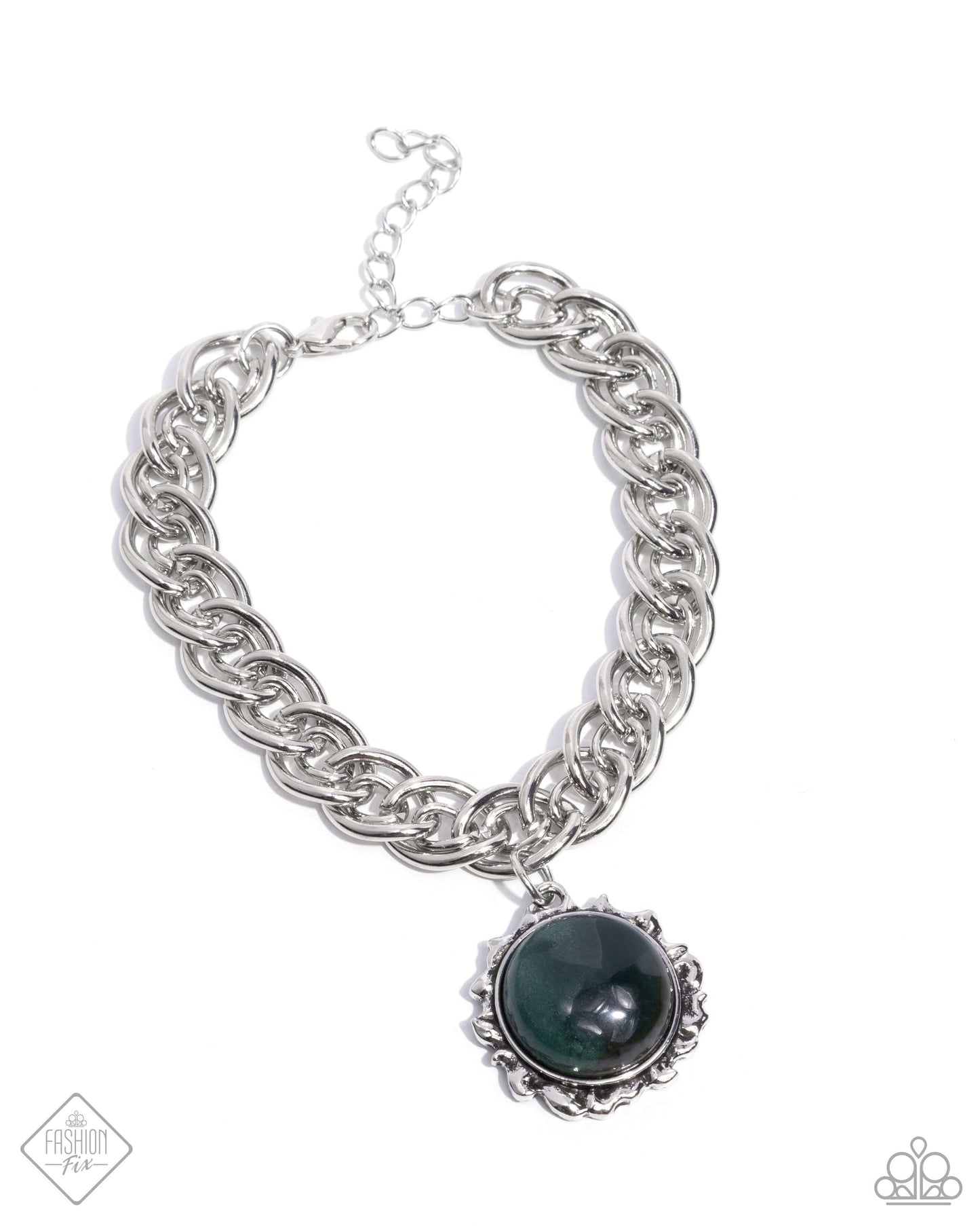 Set in a silver sun-bordered frame, a round green marbled stone radiates from a thick silver chain around the wrist for a celestially chic look. Features an adjustable clasp closure. As the stone elements in this piece are natural, some color variation is normal.