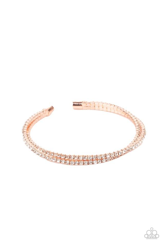 Featuring shiny copper fittings, two rows of glassy white rhinestones delicately twist into a dainty cuff around the wrist. Sold as one individual bracelet.