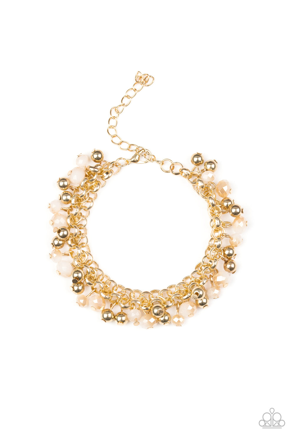 Dipped into a golden metallic shimmer, faceted white beads and classic gold beads swing from interlocking gold chains, creating a refined fringe around the wrist. Features an adjustable clasp closure.
Sold as one individual bracelet.