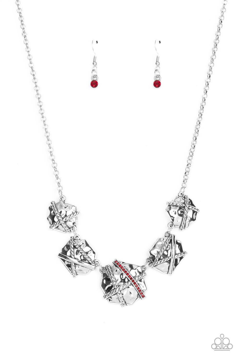 Hammered in a rustic finish, an asymmetrical collection of beveled silver frames are adorned with textured and smooth bands of silver. Gradually increasing in size, the centermost frame features a row of fiery red rhinestones for a splash of glitz below the collar. Features an adjustable clasp closure. Sold as one individual necklace. Includes one pair of matching earrings.