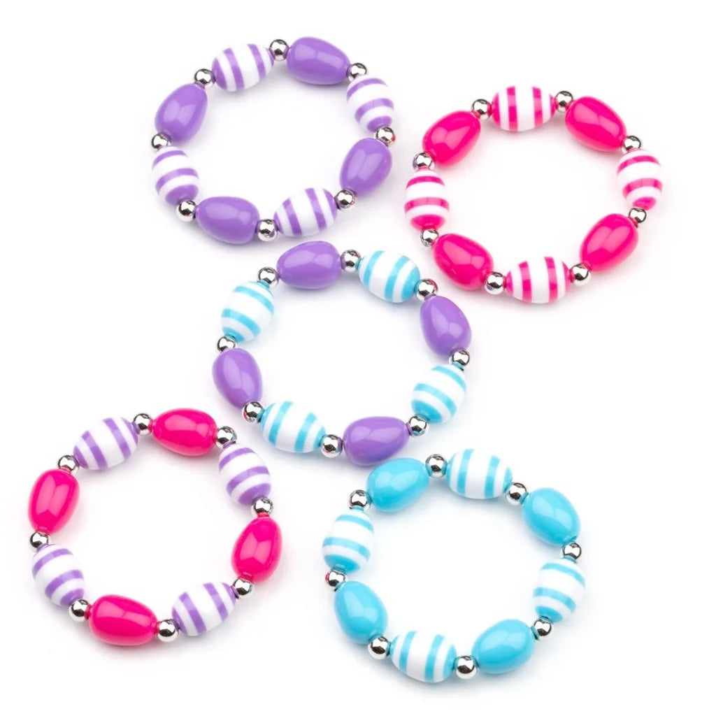 Infused with dainty silver accents, the stretchy bracelets feature solid and striped beads of blue and white. Sold as a one bracelet.