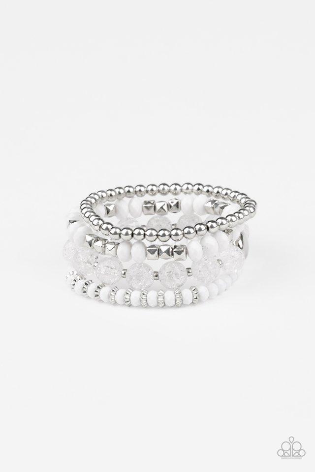 A mismatched assortment of silver, white, and crackling white glass-like beads are threaded along stretchy bands around the wrist, creating colorful layers.
Sold as one set of four bracelets.