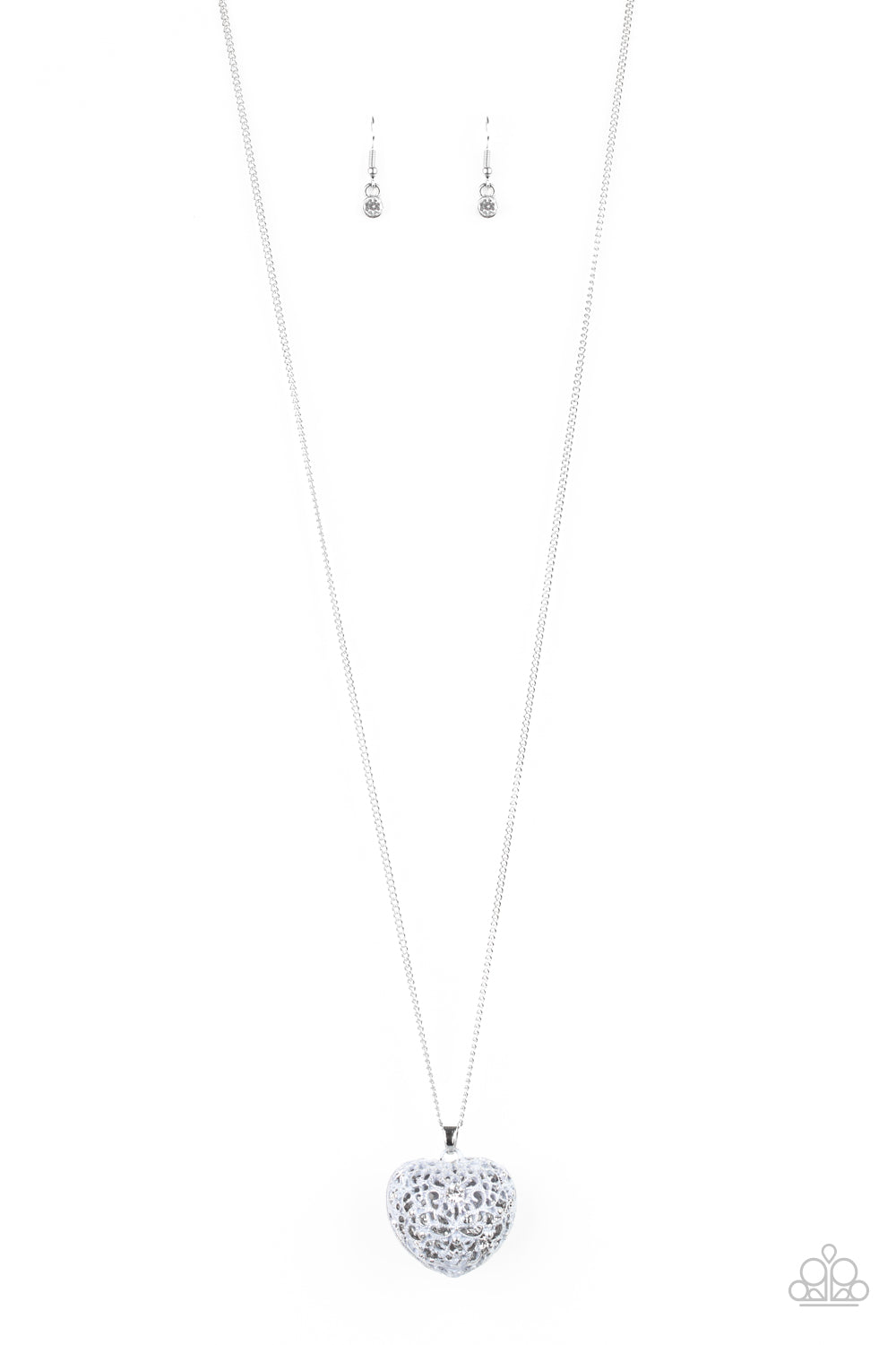 Brushed in a neutral gray finish, flowery filigree coalesces into a locket-like pendant at the bottom of a shimmery silver chain. A glassy white rhinestone dots the vintage inspired frame for a whimsical finish. Features an adjustable clasp closure. Sold as one individual necklace. Includes one pair of matching earrings.
