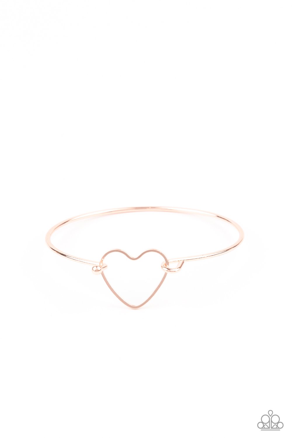 A dainty rose gold heart frame attaches to a dainty rose gold bangle-like cuff, creating a flirty centerpiece around the wrist. Features a toggle closure. Sold as one individual bracelet.