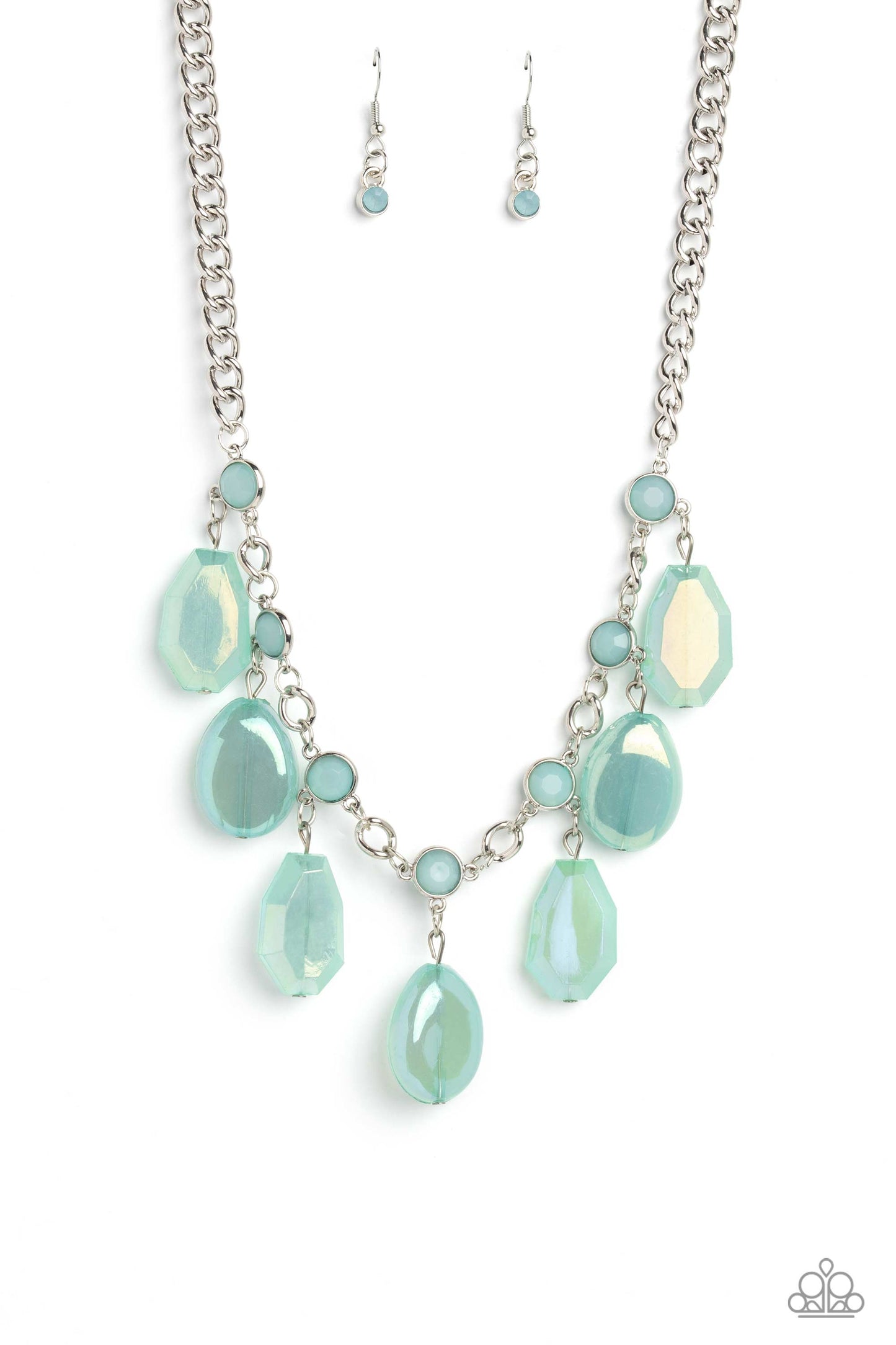 A collection of chiseled, clear and milky geometric shapes in Waterspout hues feature an iridescent overlay as they cascade from a silver curb chain, resulting in a bubbly and boisterous fringe below the collar. A layer of faceted milky Waterspout beads are infused along the silver chain for an additional pop of color. Features an adjustable clasp closure. Sold as one individual necklace. Includes one pair of matching earrings.