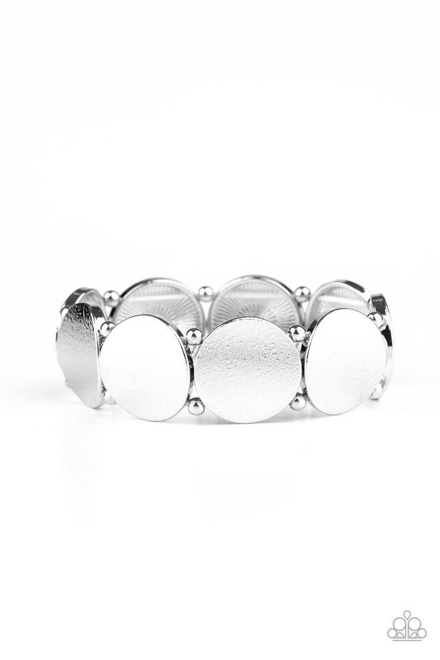 Infused with pairs of dainty silver beads, delicately hammered silver discs slide along a stretchy band around the wrist for a hint of industrial flavor.
Sold as one individual bracelet.
