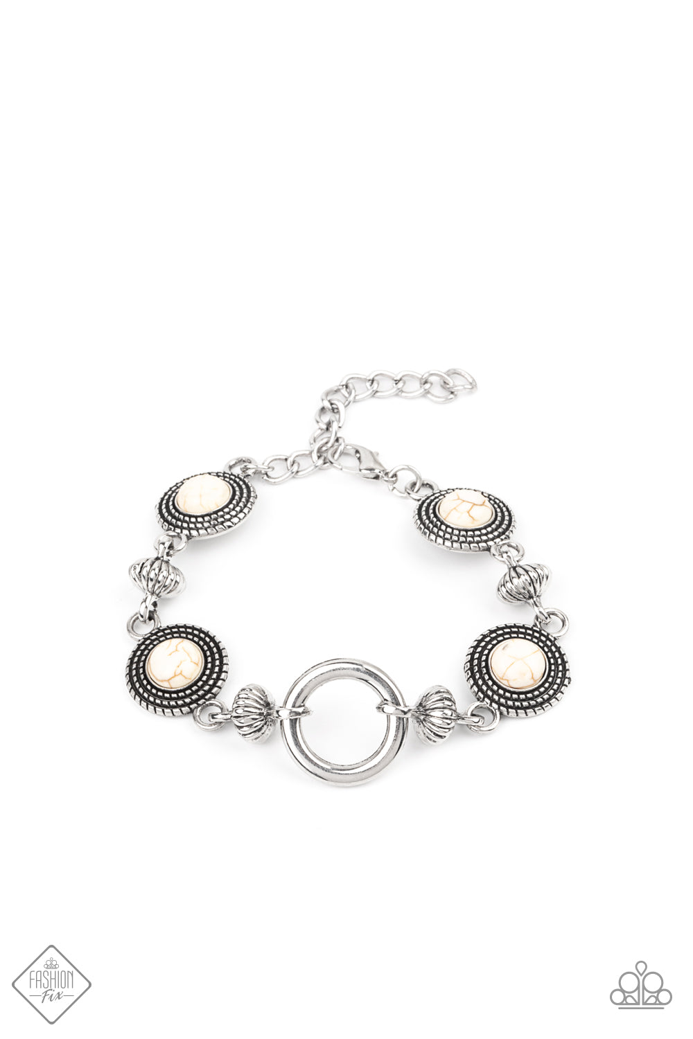 Featuring an airy silver hoop centerpiece, a rustic collection of silver beads and silver discs dotted in white stones delicately link around the wrist for a seasonal look. Features an adjustable clasp closure. Sold as one individual bracelet.
