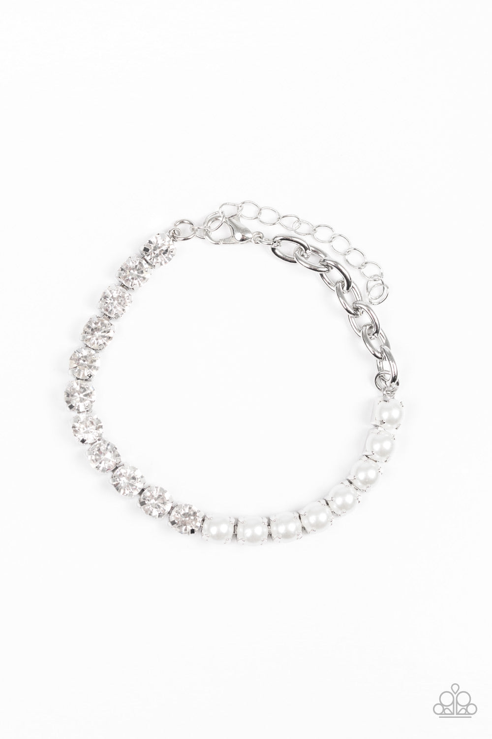 Featuring square silver fittings, a row of pearly white beads connect with a row of glittery white rhinestones for a modern twist. Features an adjustable clasp closure. Sold as one individual bracelet.