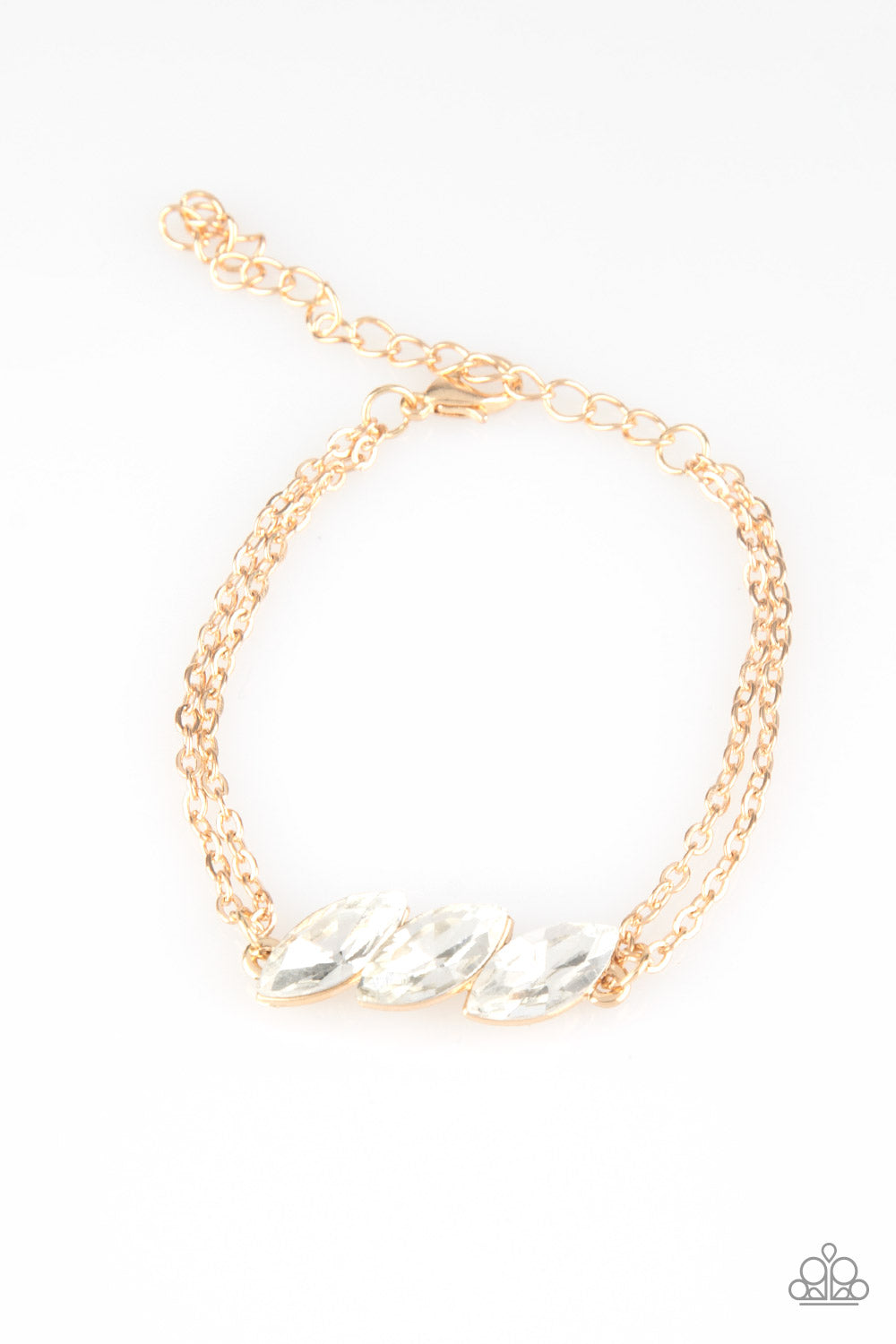 Featuring regal marquise-cuts, a trio of glittery white rhinestones join across the center of the wrist for a timeless look. Features an adjustable clasp closure.
Sold as one individual bracelet.