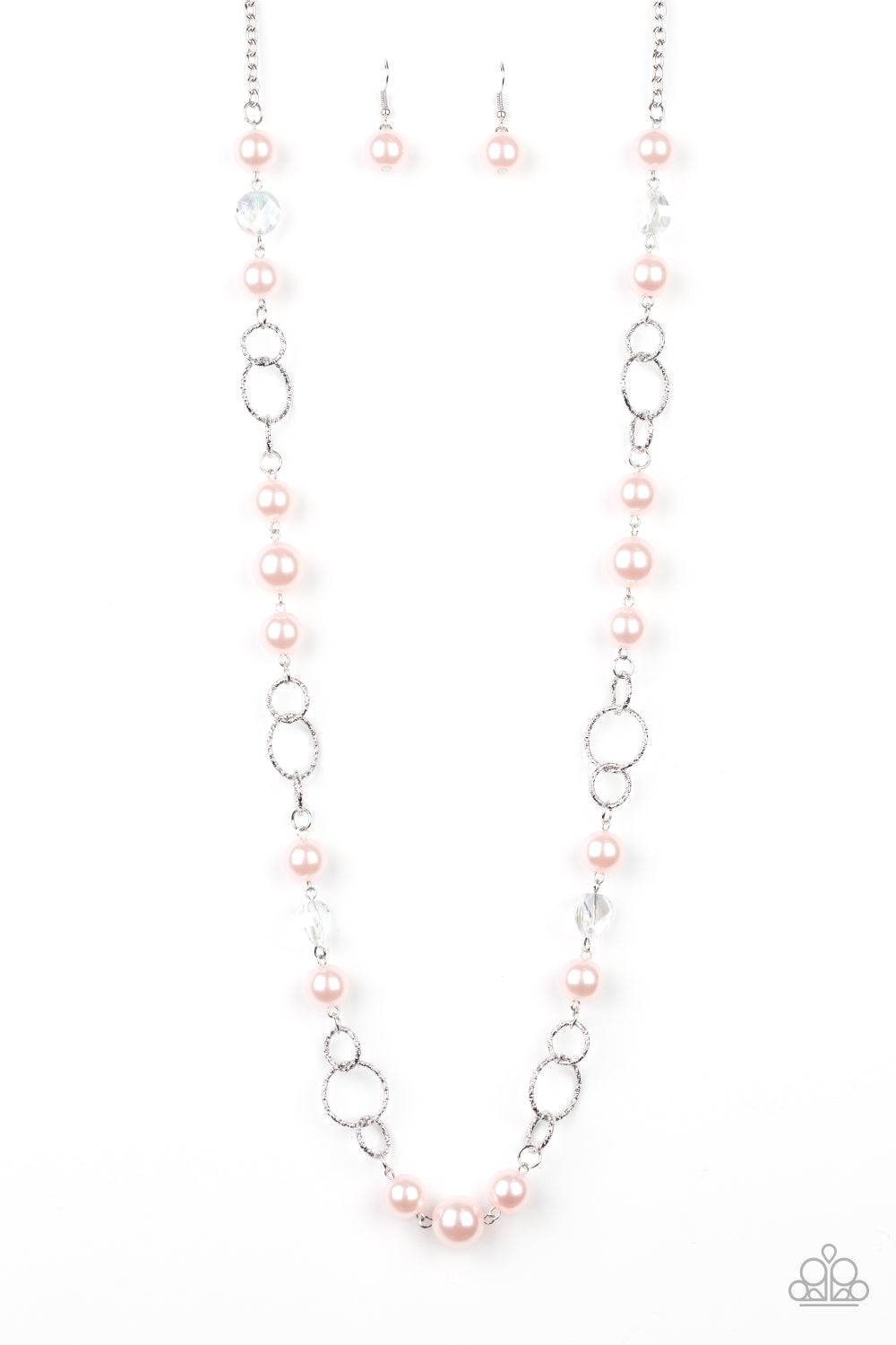A refined collection of glassy white gems, textured silver rings, and pearly pink beads drape across the chest for a timeless look. Features an adjustable clasp closure. Sold as one individual necklace. Includes one pair of matching earrings.