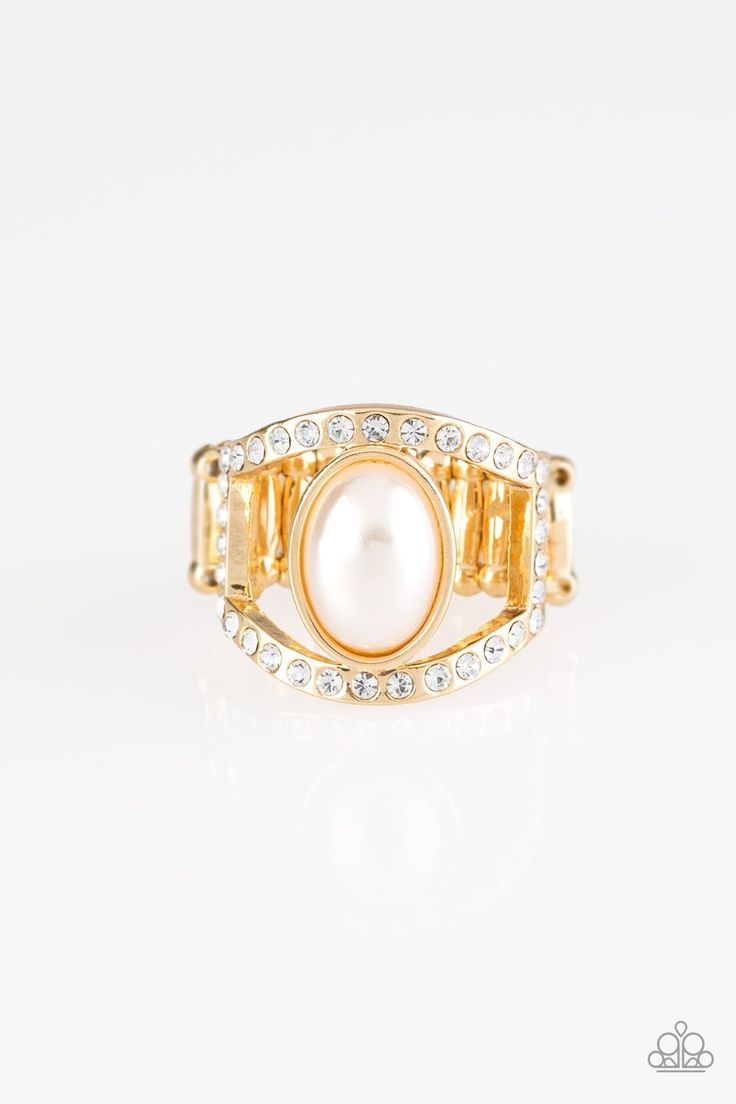 A pearly white bead sits between two white rhinestone encrusted bands, creating the illusion of a floating centerpiece. Features a stretchy band for a flexible fit. Sold as one individual ring. Paparazzi Accessories