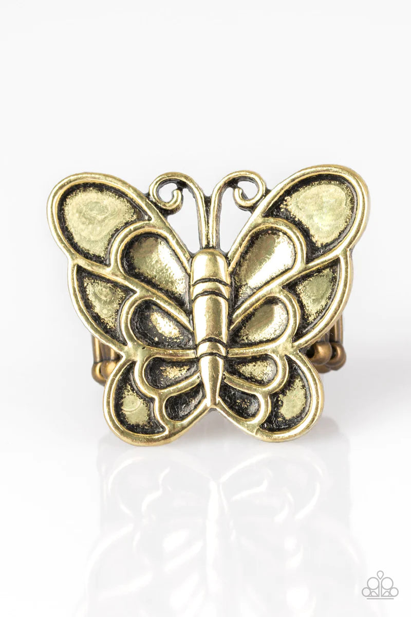 Brushed in an antiqued finish, a dramatic brass butterfly blooms across the finger for a whimsical look. Features a stretchy band for a flexible fit. Sold as one individual ring.