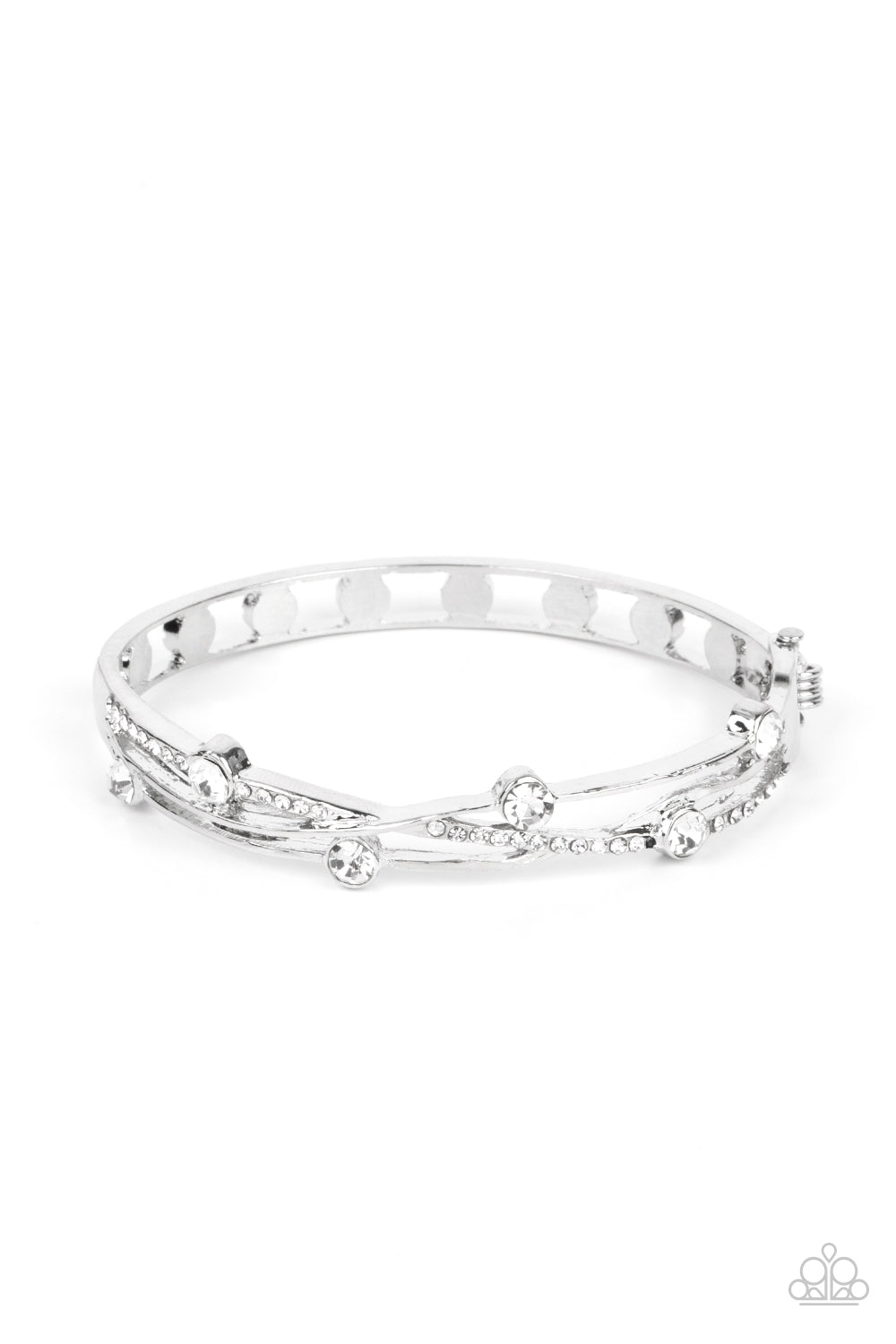 Dotted with glittery white rhinestones, smooth silver and white rhinestone dotted ribbons delicately intertwine into a decorative bangle-like bracelet around the wrist. Features a hinged closure. Sold as one individual bracelet.