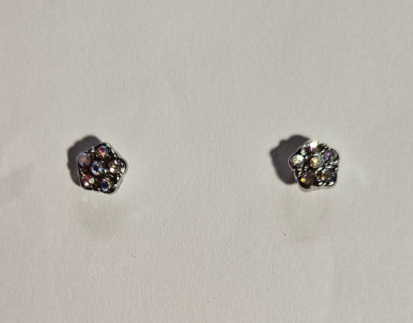 Kids' silver flower shaped earrings with white multi-colored rhinestones