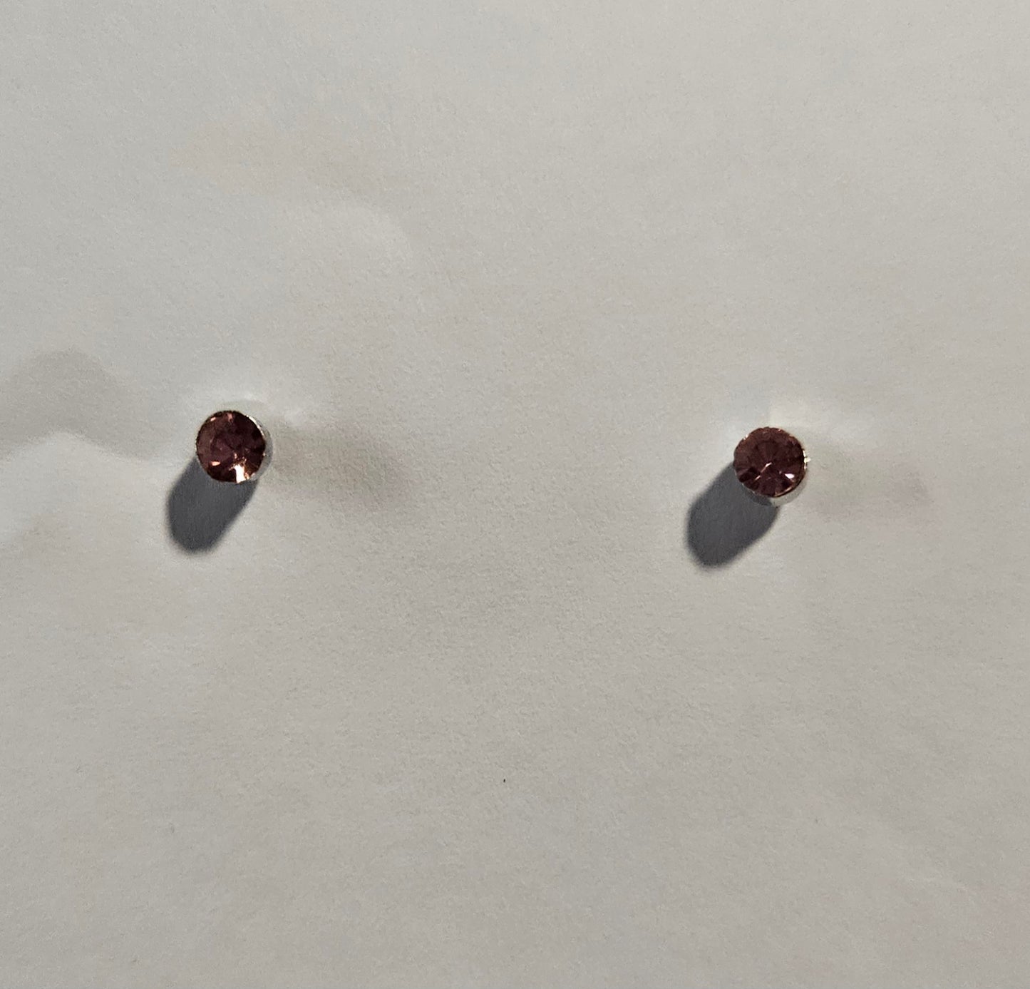Kids' small round earrings with pink rhinestone