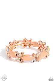 Featuring a shimmery, milky texture, Tender Peach marquise-cut beads alternate with a cluster of smaller marquise-cut gems that fan out in a spectacular display. Pronged in rose gold fittings, the dainty champagne, peach, and iridescent marquise-cuts twinkle and shimmer along elastic stretchy bands around the wrist, for a soft-hearted finish. Due to its prismatic palette, color may vary.