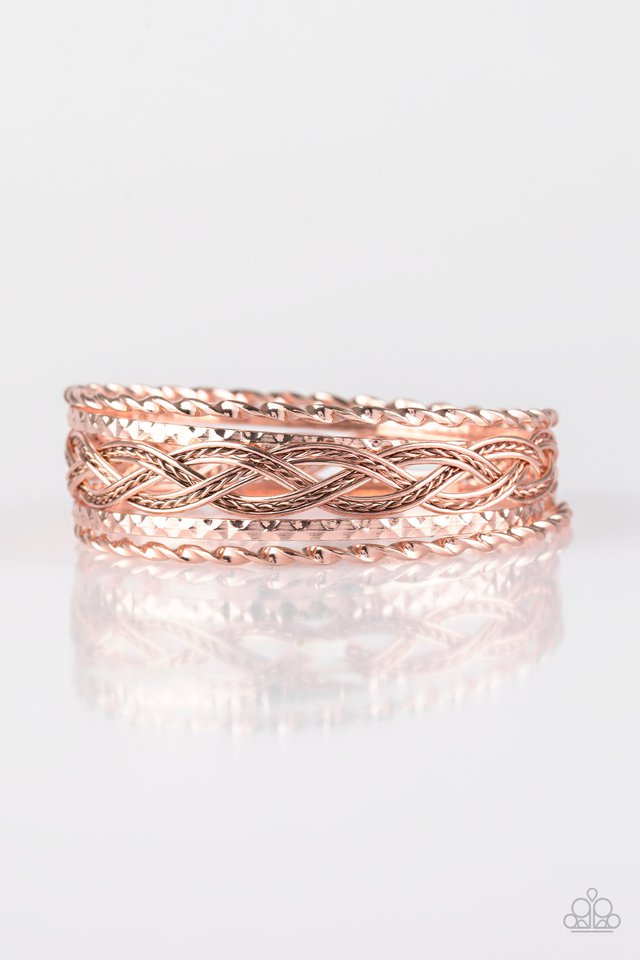 Featuring smooth and textured finishes, mismatched rose gold bangles glide along the wrist for a causal fashion. Sold as one set of five bracelets.