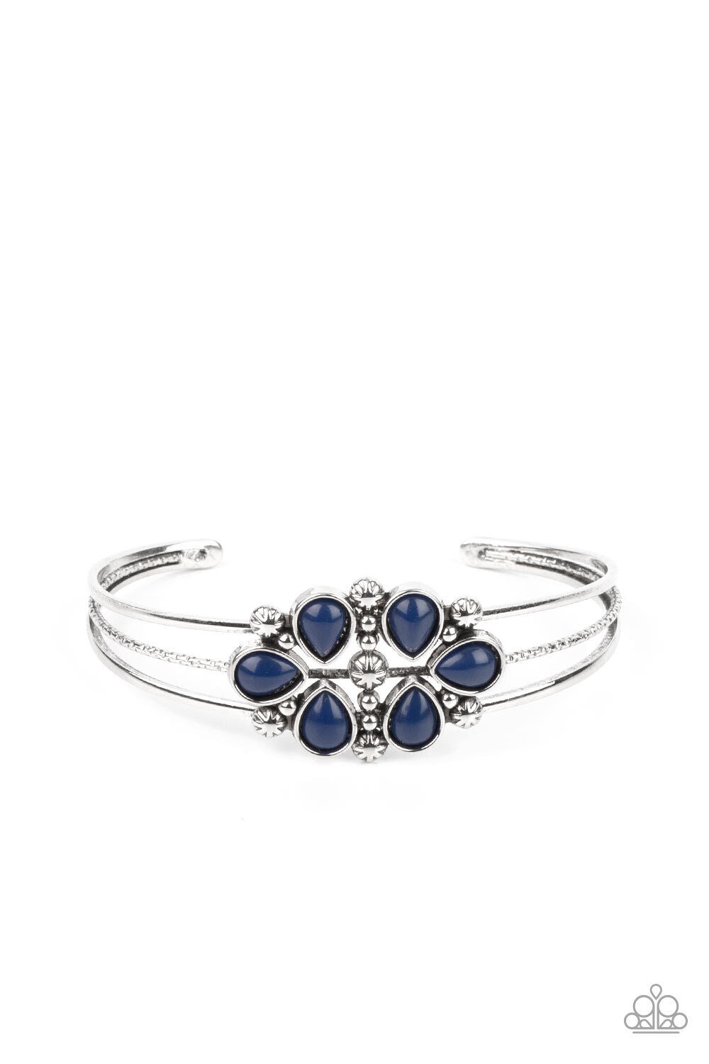 A whimsical collection of glassy blue teardrop beads, dainty silver studs, and silver floral accents coalesce into a colorful centerpiece atop a layered silver cuff. Sold as one individual bracelet.