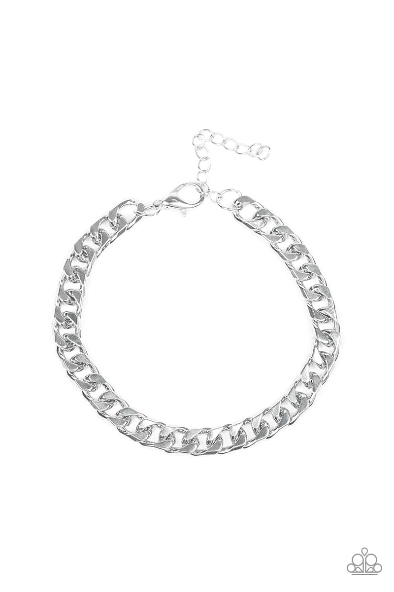 Featuring classic curb link chain, a thick silver chain wraps around the wrist for a sleek, metro look. Features an adjustable clasp closure. Sold as one individual bracelet.