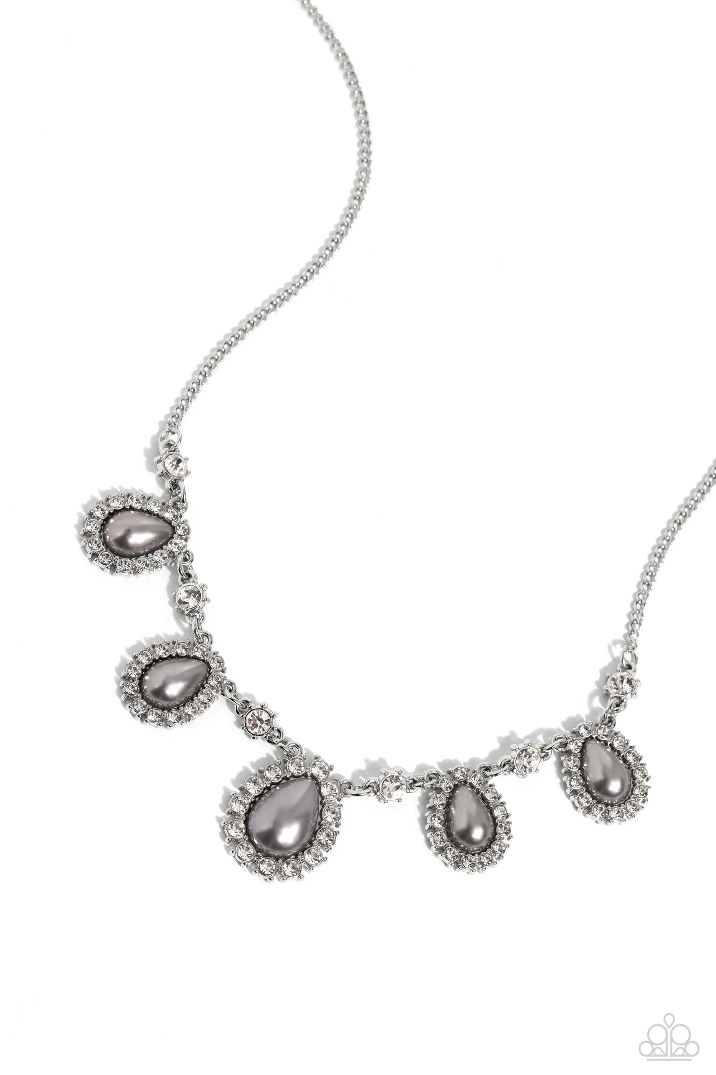 Delicately pressed in white rhinestone-encrusted frames, a collection of Ultimate Gray pearl teardrops alternate with solitaire white gems below the collar for a refined glitzy statement. Features an adjustable clasp closure. Sold as one individual necklace. Includes one pair of matching earrings.
