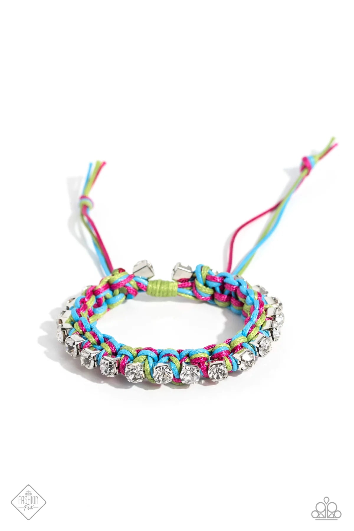 Strands of pink, blue and green cording ornately weave across the wrist, creating an earthy braid. Sporadically dotted through the cording, white rhinestones, set in silver square fittings add a bit of lively dazzle to the colorful design. Features an adjustable sliding knot closure. Sold as one individual bracelet.