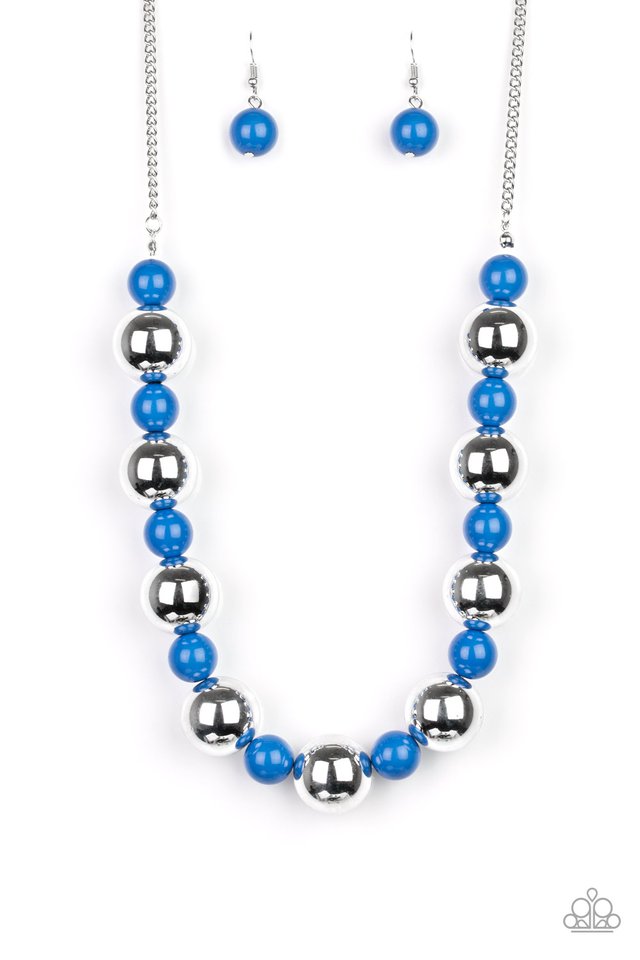 Polished blue beads and dramatic silver beads drape below the collar for a perfect pop of color. Features an adjustable clasp closure. Sold as one individual necklace. Includes one pair of matching earrings.