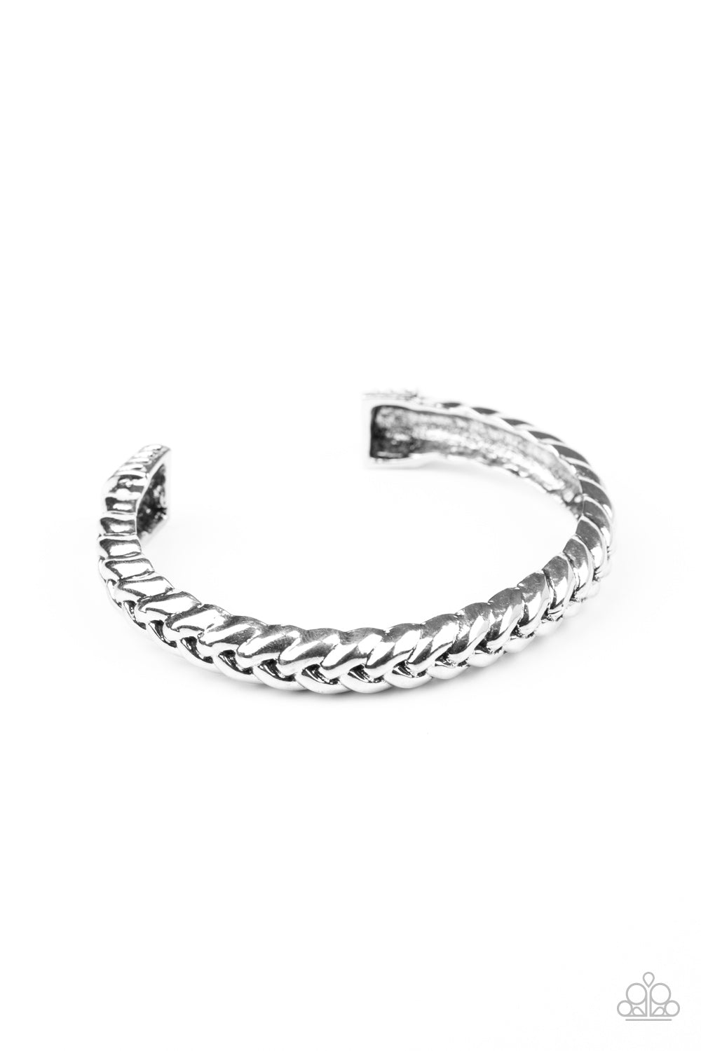 Infused with decorative silver fittings, antiqued silver bars thickly weave into a bold industrial cuff around the wrist. Sold as one individual bracelet.