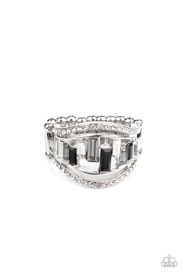 White rhinestone encrusted bands flank a row of emerald cut glass beads in shades of black, gray, and white for a regal look. Features a stretchy band for a flexible fit. Sold as one individual ring.