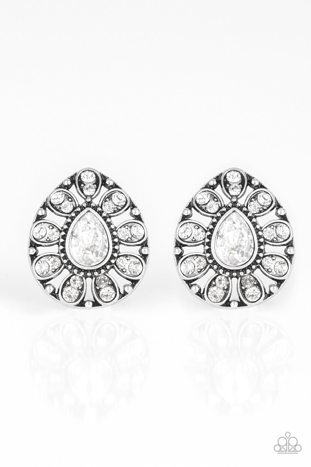 A teardrop silver frame is encrusted in glittery white rhinestones, creating a sparkling floral frame. Earring attaches to a standard post fitting. Sold as one pair of post earrings.