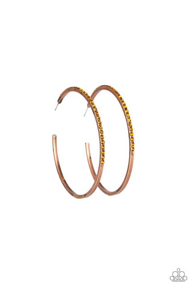 The front half of a copper hoop is encrusted in topaz rhinestones for a radiant look. Earring attaches to a standard post fitting. Hoop measures 2 1/4" in diameter. Sold as one pair of hoop earrings.