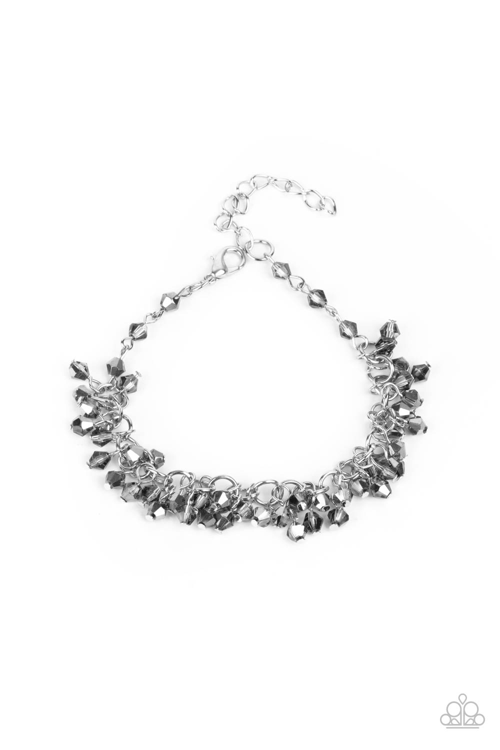 Flecked in hematite, dainty smoky crystal-like beads swing from a classic silver chain, creating a clustered fringe around the wrist. Features an adjustable clasp closure.
Sold as one individual bracelet.