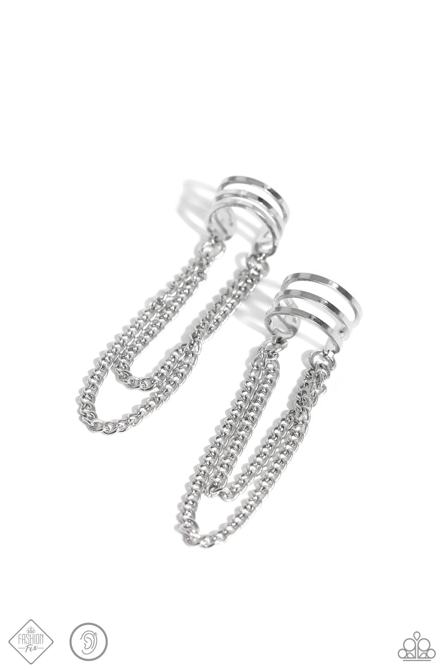 Trestles of dainty shimmery silver chains cascade from the bottom of a stacked, airy silver cuff, creating an adjustable, edgy, one-size-fits-all display. Sold as one pair of cuff earrings.