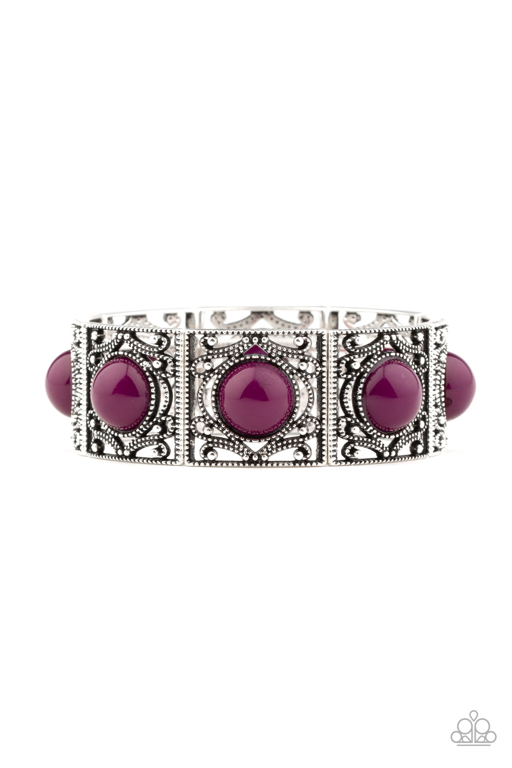Dotted with vivacious purple beads, shimmery silver filigree filled frames are threaded along a stretchy band around the wrist for a whimsical look.
Sold as one individual bracelet.