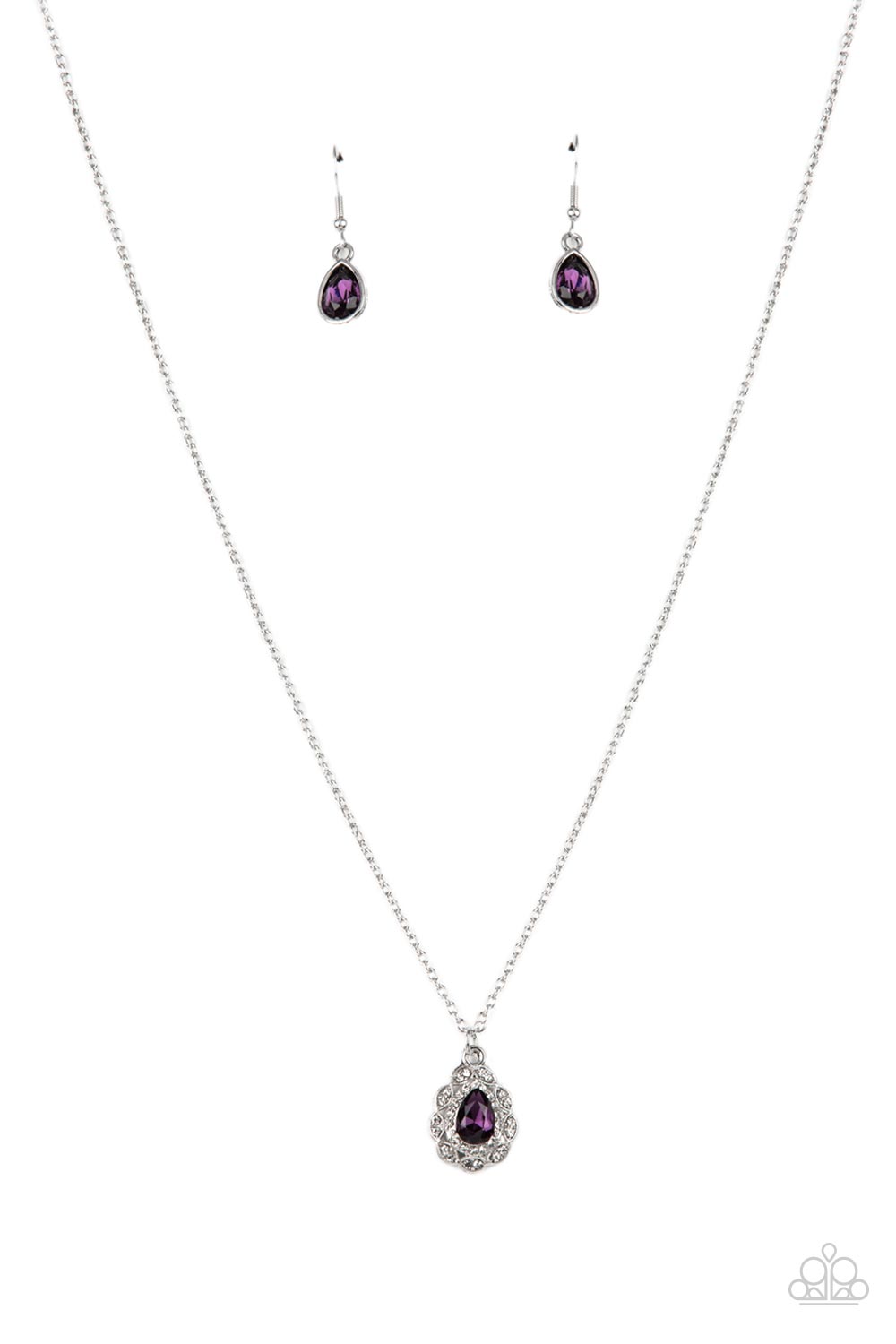A glittery purple teardrop gem is pressed into the center of a pronged border of glassy white rhinestones that sits atop a ring of a silver frame dotted in pairs of white rhinestones. The glittery pendant swings from the bottom dainty silver chain, creating a vintage inspired pendant below the collar. Features an adjustable clasp closure. Sold as one individual necklace. Includes one pair of matching earrings.