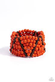 Stacked layers of vibrant orange wooden beads are threaded along stretchy bands making a bold statement. Slender wooden bars are woven in on an angle and lean in opposite directions as they work their way around the wrist resulting in an island-inspired vibe. Sold as one individual bracelet.